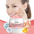 Wiyun Dragon Blood Extract face cream with a woman applying it to her face.