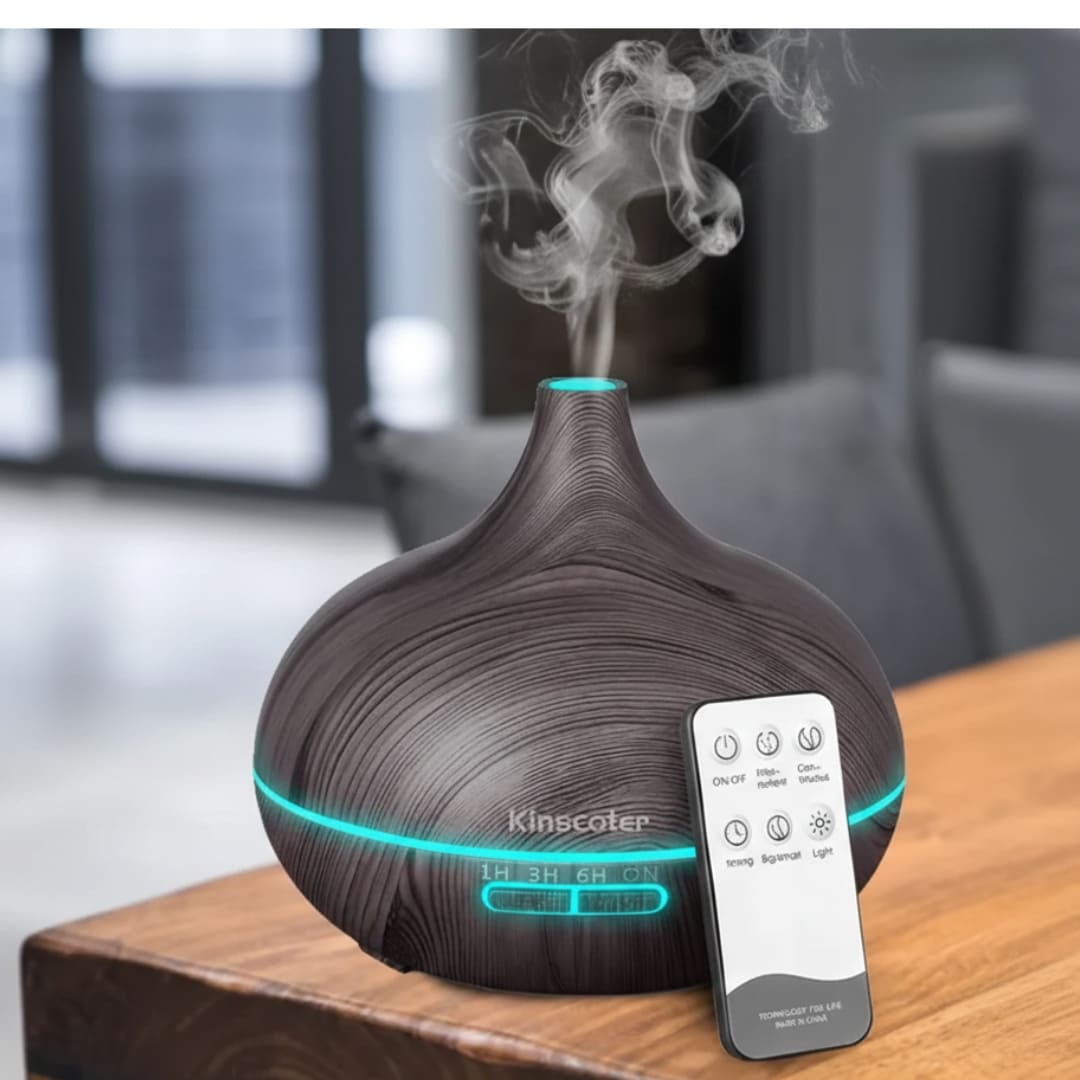 Aromatherapy diffuser with remote control on a wooden surface