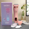 Pink lady shaver with packaging on a gray surface