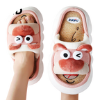 Pair of cartoon pink bear slippers with a smiling face design on a white background